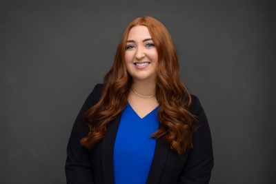 woman blue shirt headshot