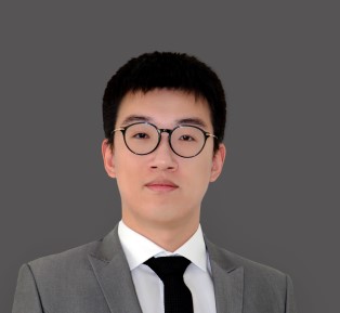 man in grey suite headshot photo