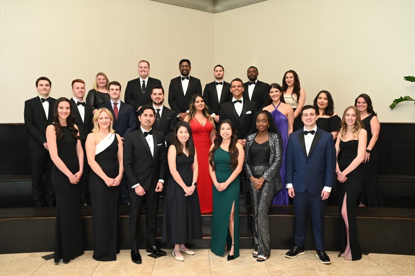 people dressed up at awards gala