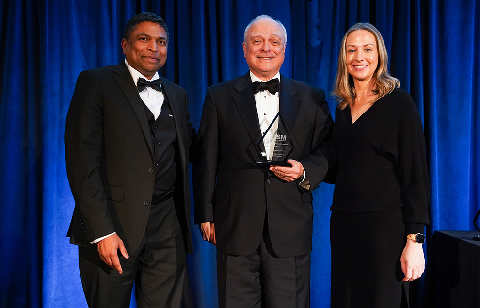 trailblazer men women standing on stage