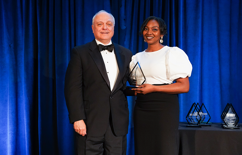 trailblazer-winner lady and man standing award