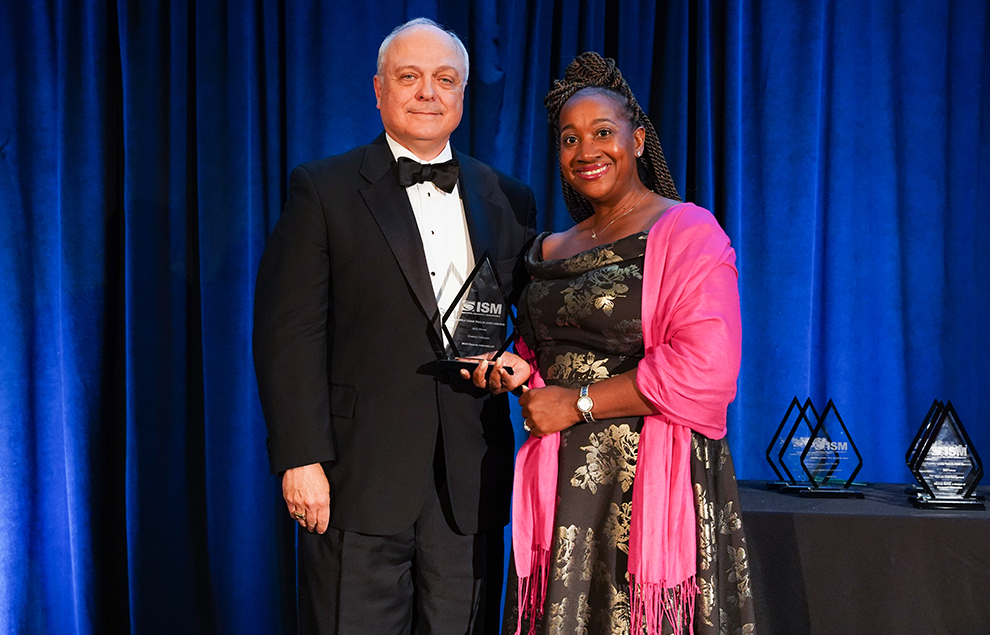 trailblazer-winner lady man standing award