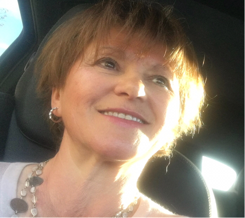 Maria Lindenberg Smiling Selfie with sun on her face